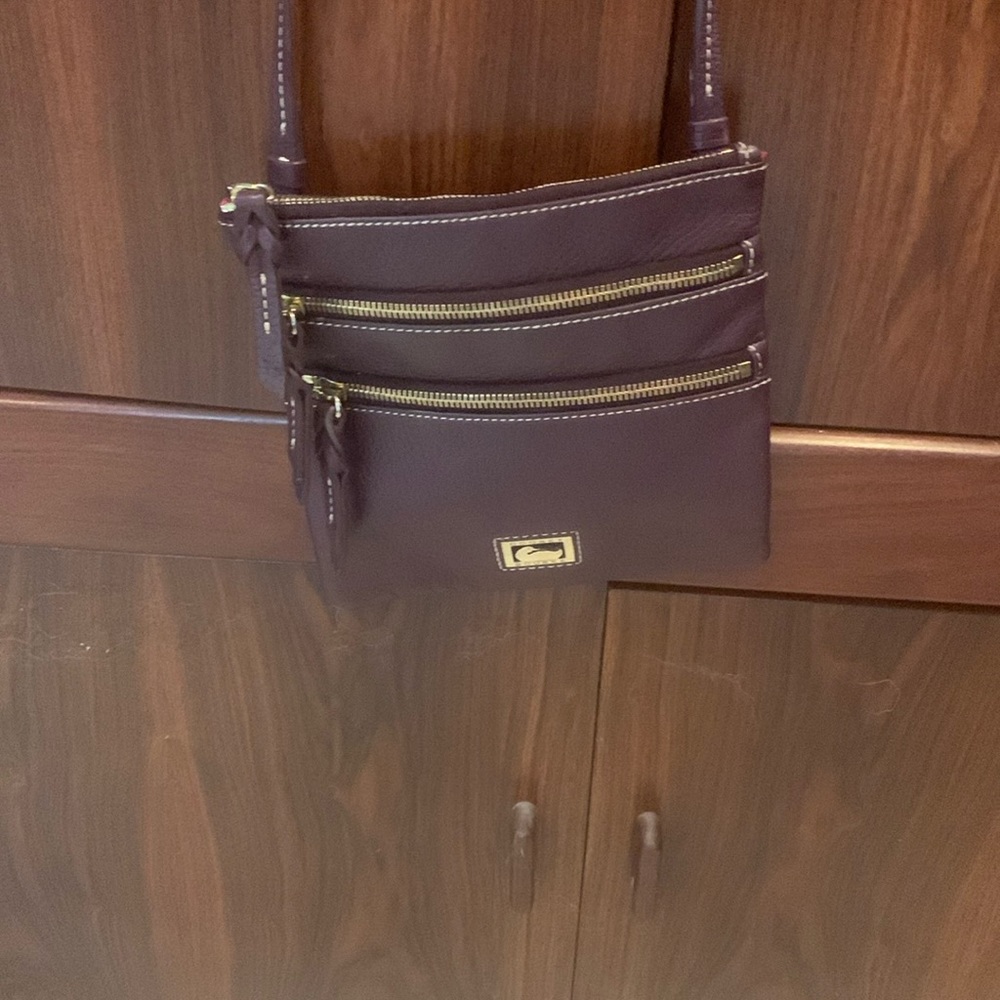 Beautiful almost like new Dooney & Bourke purse!! Never worn!